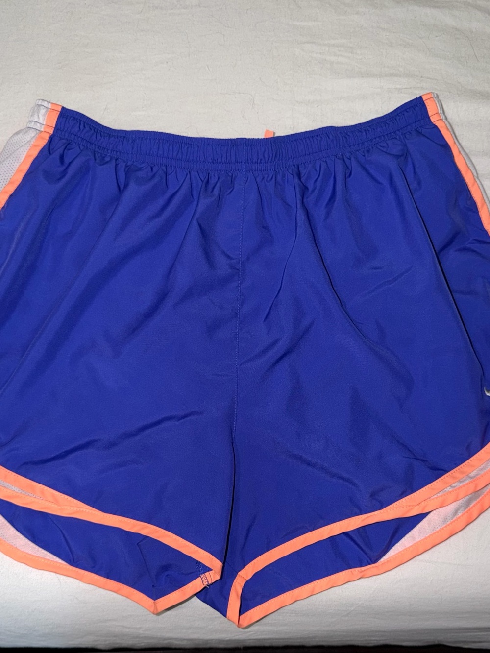 Nike Women's Royal Blue Athletic Shorts with Coral Trim